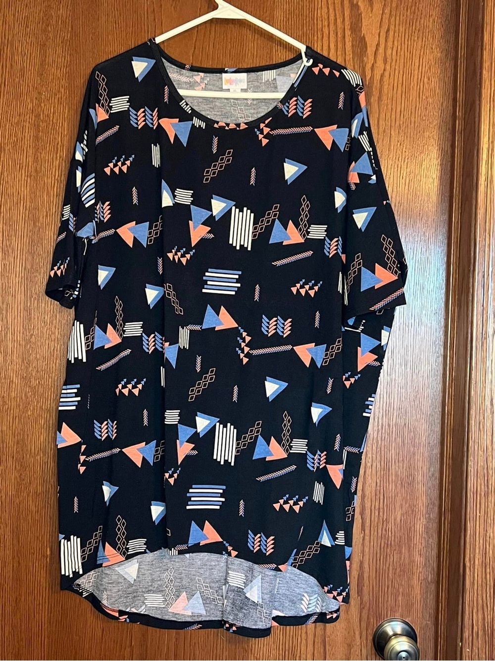 LuLaRoe Black Short Sleeve Top with Blue, Coral and White Geometric Print